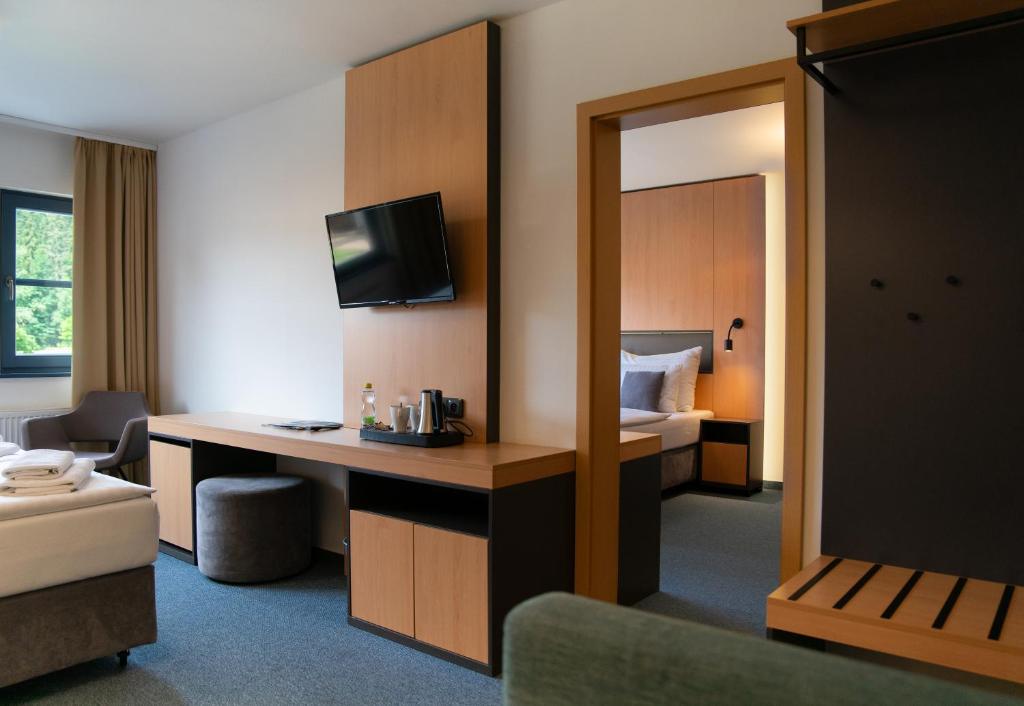 Postel nebo postele na pokoji v ubytování Resort Špindl