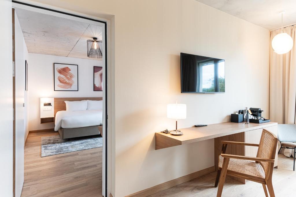 Postel nebo postele na pokoji v ubytování voco Beaune , Cité des Vins by IHG