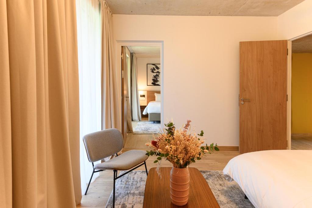 Postel nebo postele na pokoji v ubytování voco Beaune , Cité des Vins by IHG