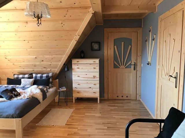 Letto o letti in una camera di Znak Gór