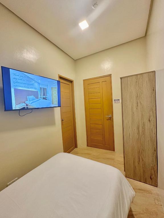 TV a/nebo společenská místnost v ubytování THE VELVET SUITES AND HOTEL