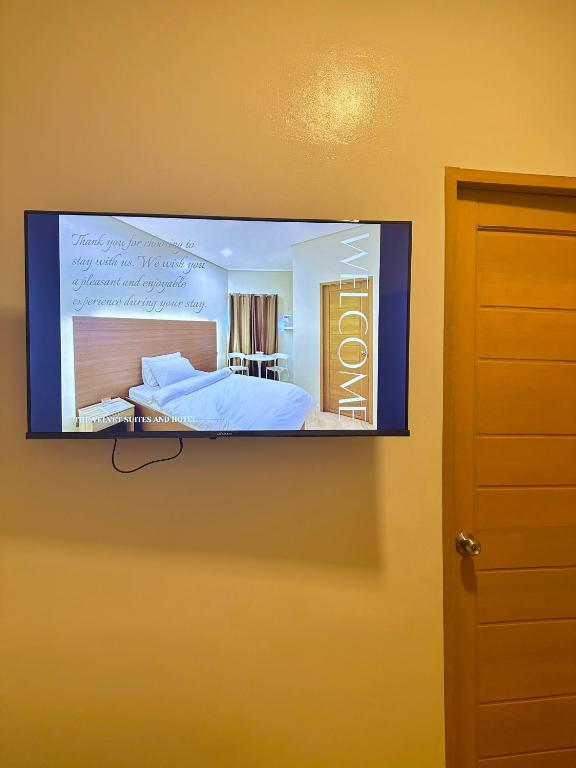 TV a/nebo společenská místnost v ubytování THE VELVET SUITES AND HOTEL