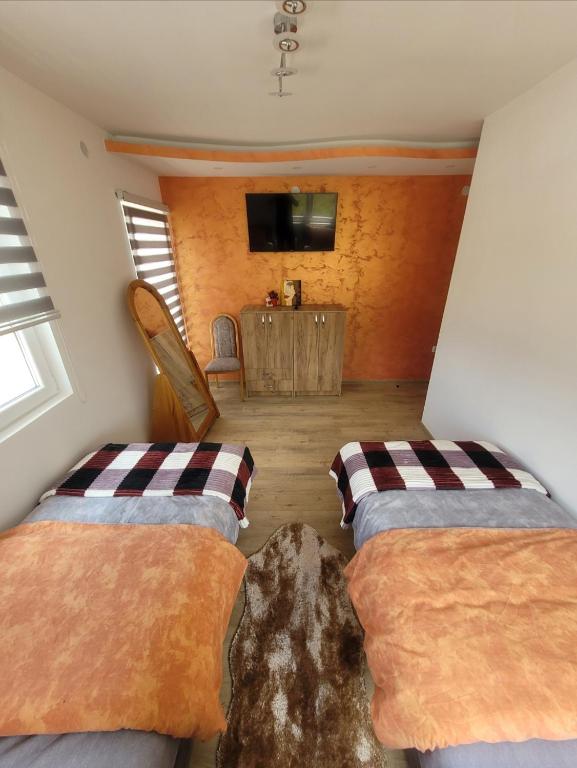 Postel nebo postele na pokoji v ubytování Apartman Zlatar-Vasiljevic