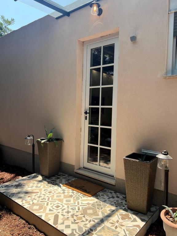 Patio nebo venkovní prostory v ubytování Little Oasis