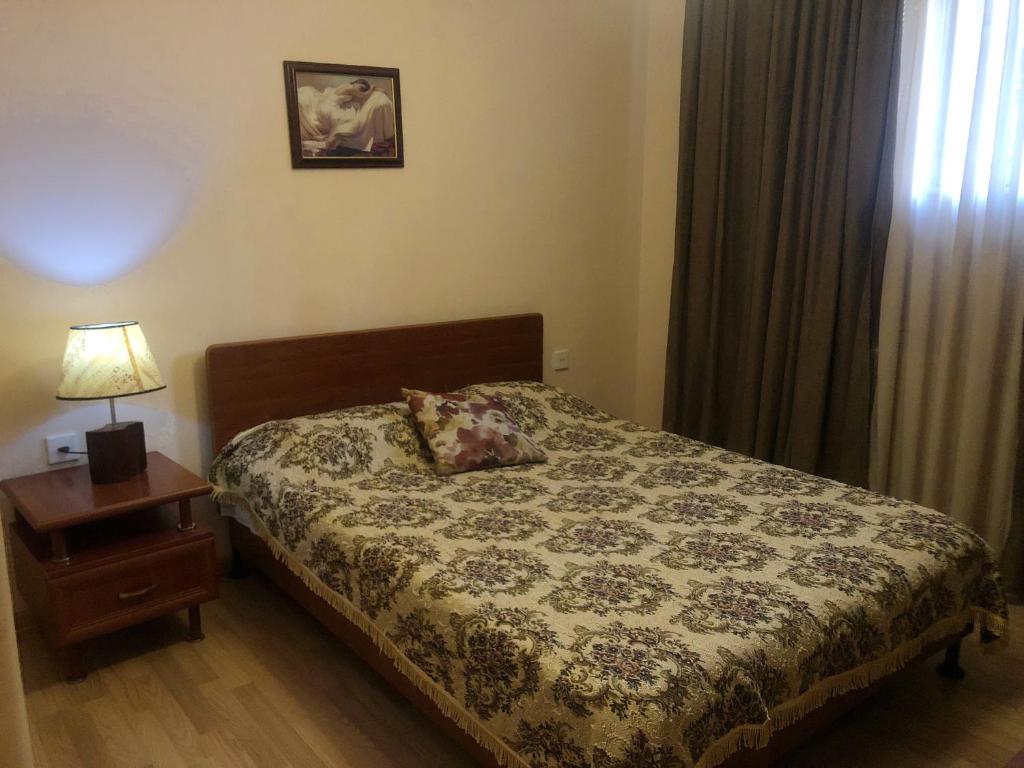 Postel nebo postele na pokoji v ubytování Piano Hotel