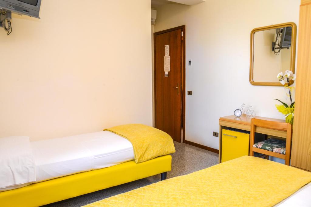 Postel nebo postele na pokoji v ubytování Garni Onda