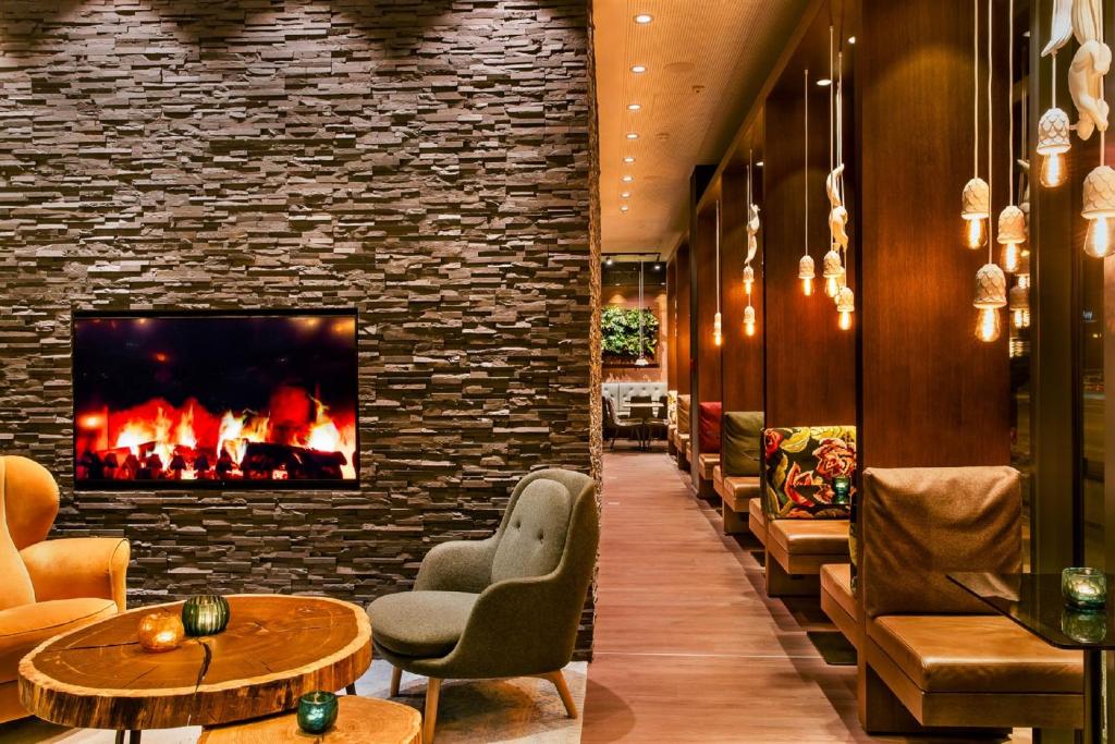 Posezení v ubytování Motel One Salzburg-Süd