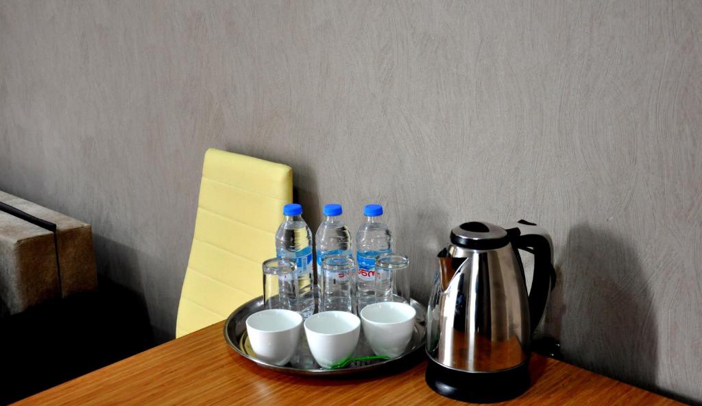 Příslušenství pro přípravu čaje a kávy v ubytování Hotel Voyager