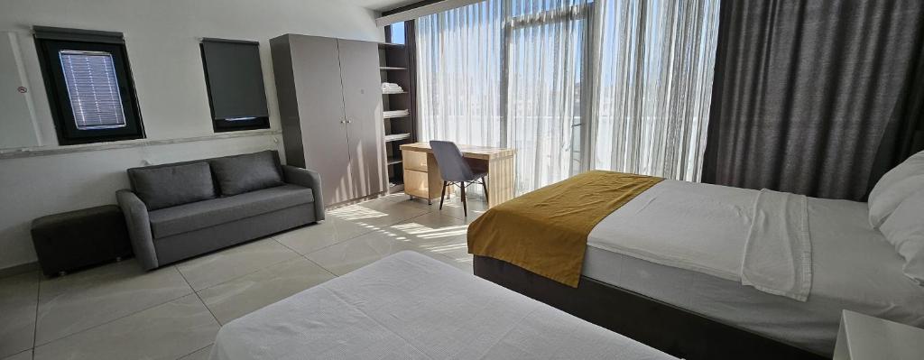 Postel nebo postele na pokoji v ubytování Tut Hotel