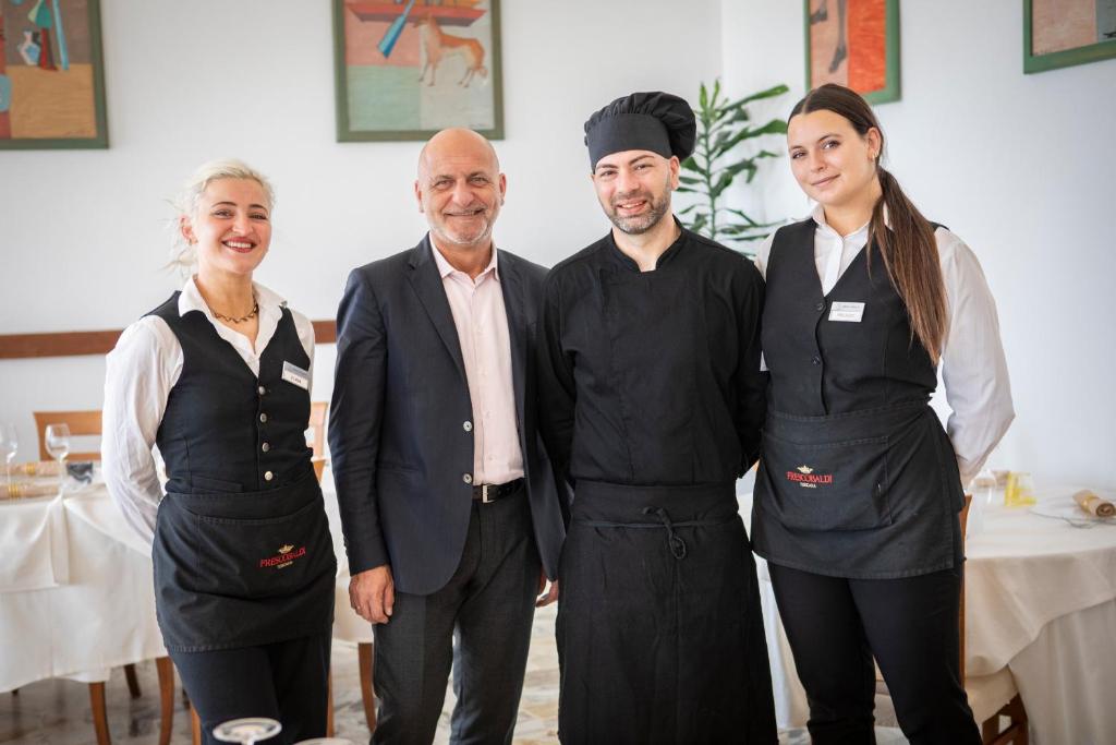 Členové personálu v ubytování Hotel Parrini