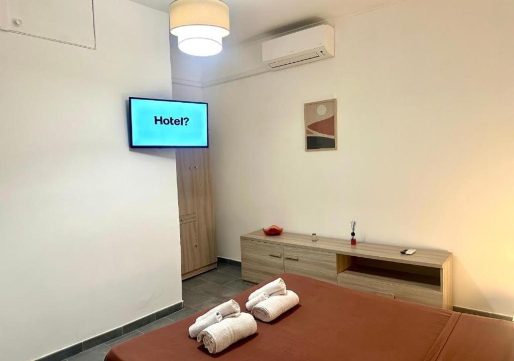 Postel nebo postele na pokoji v ubytování Jacuzzi con Vista Favelas - Il Tuo Rifugio Esotico Urbano