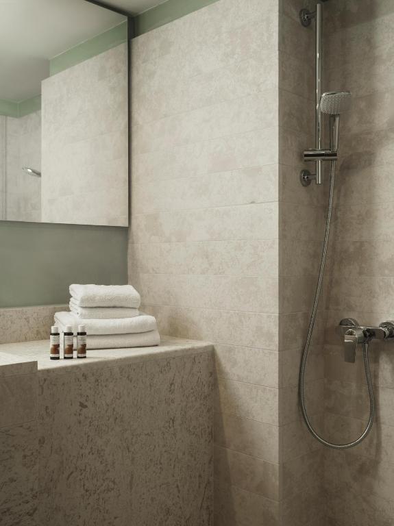 Koupelna v ubytování Civitel Attik Rooms & Suites