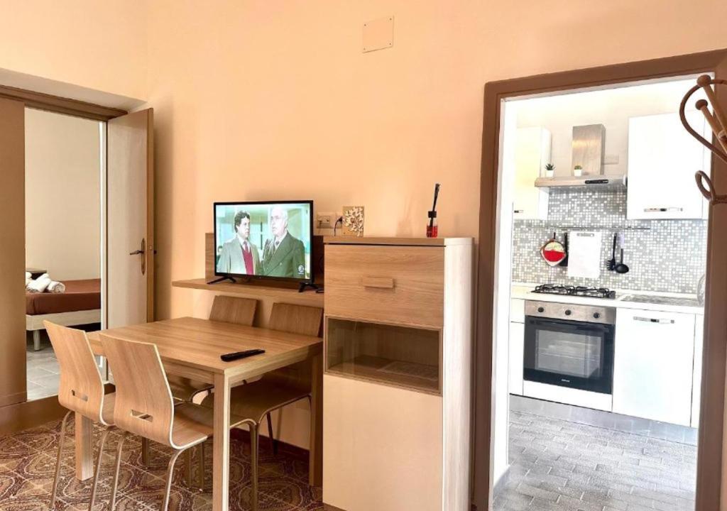 Kuchyň nebo kuchyňský kout v ubytování Jacuzzi con Vista Favelas - Il Tuo Rifugio Esotico Urbano