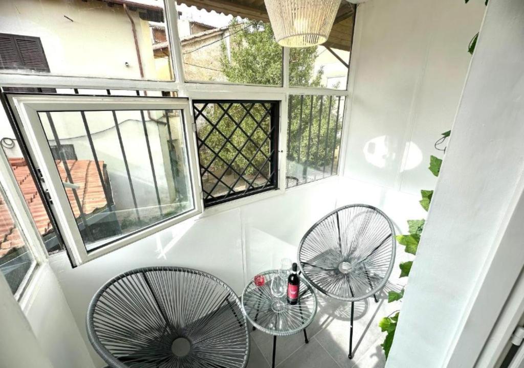 Balkón nebo terasa v ubytování Jacuzzi con Vista Favelas - Il Tuo Rifugio Esotico Urbano