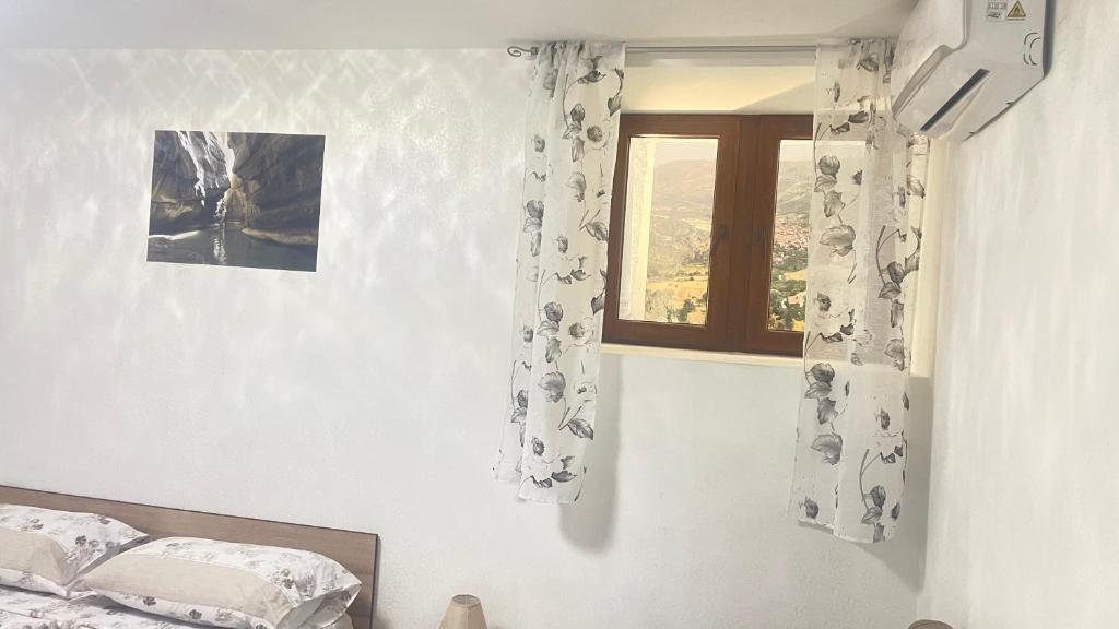 Posezení v ubytování L'oasi del raganello