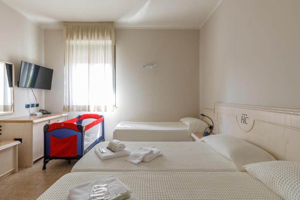 Postel nebo postele na pokoji v ubytování Hotel Classicano