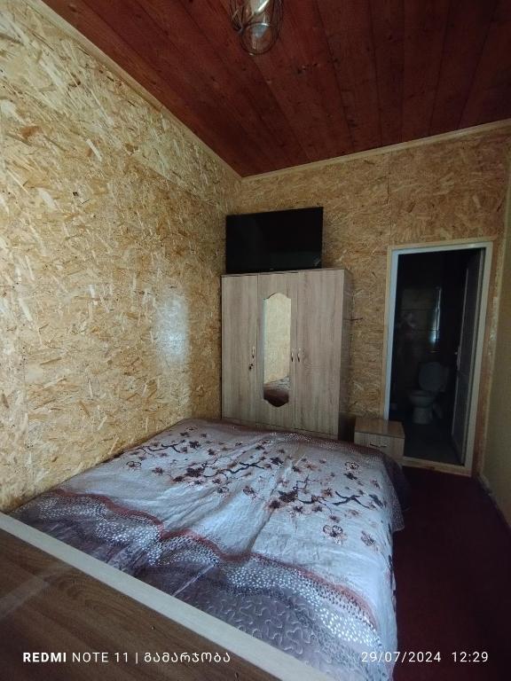 Postel nebo postele na pokoji v ubytování guest house udziro