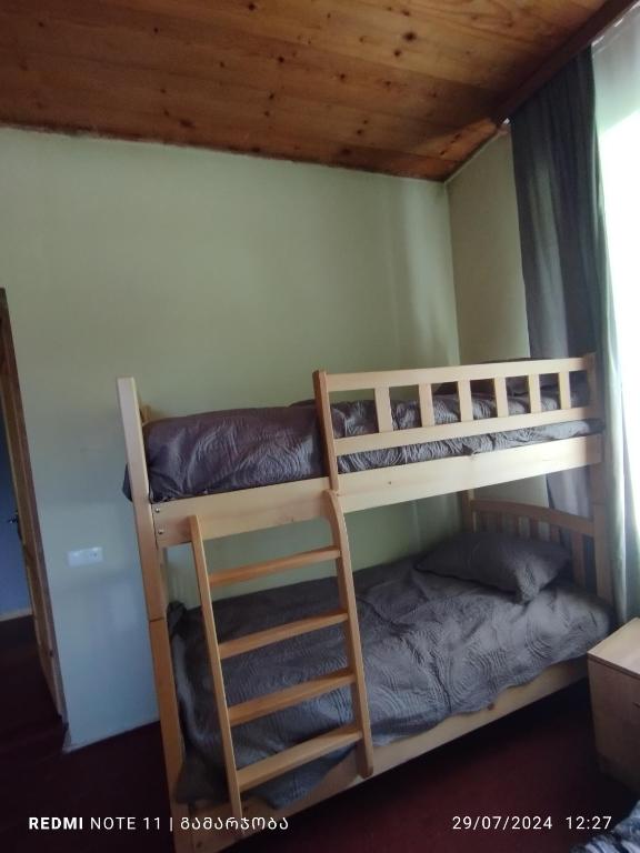 Postel nebo postele na pokoji v ubytování guest house udziro