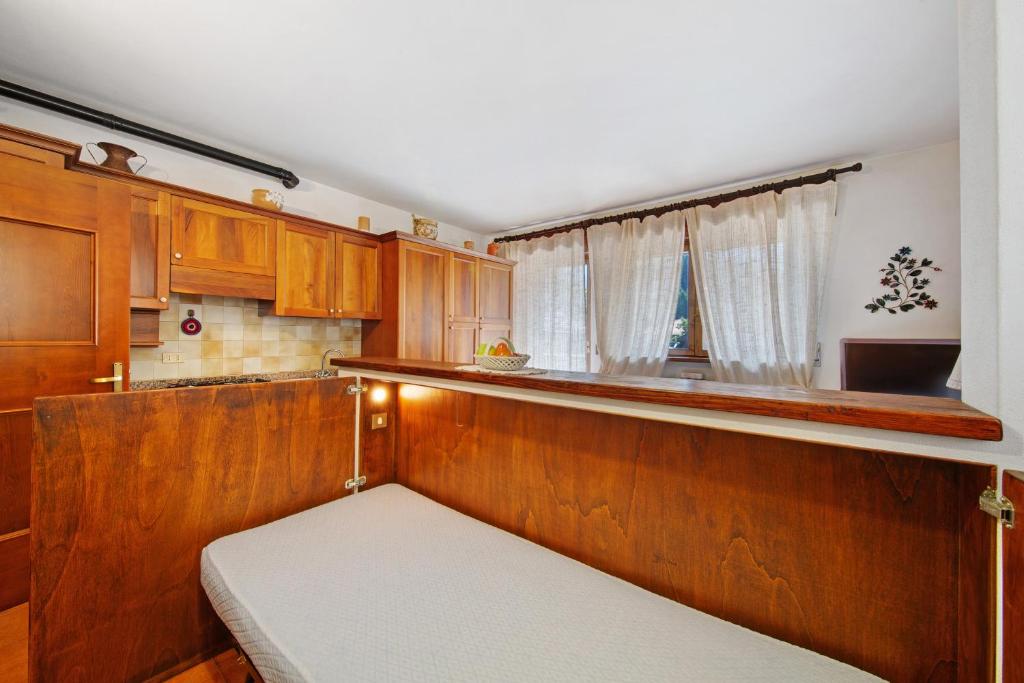 Kuchyň nebo kuchyňský kout v ubytování Monolocale Monti Pallidi