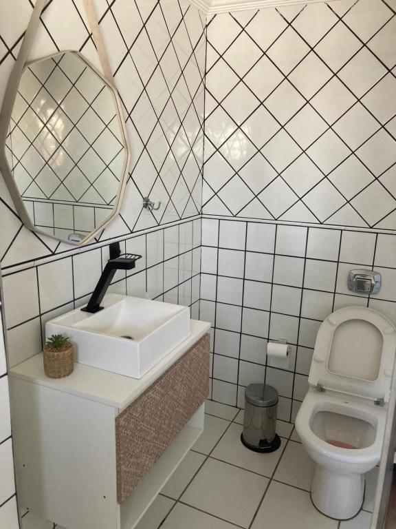 Koupelna v ubytování Aconchego no Recanto