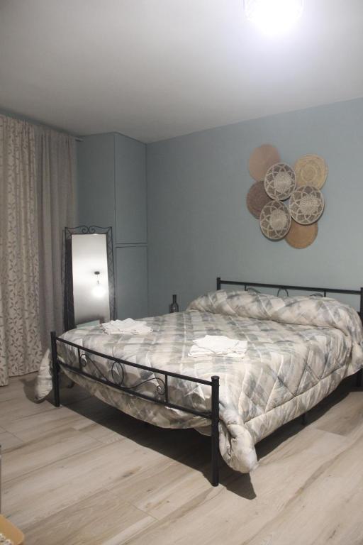 Postel nebo postele na pokoji v ubytování Casa Vacanze Sud e Magia