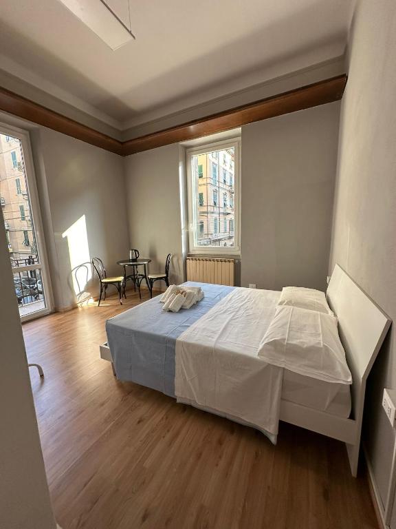 Postel nebo postele na pokoji v ubytování Redamare Suites