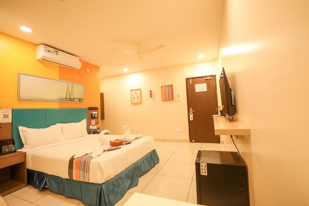Postel nebo postele na pokoji v ubytování Hotel White Fields Hitec City, Hyderabad
