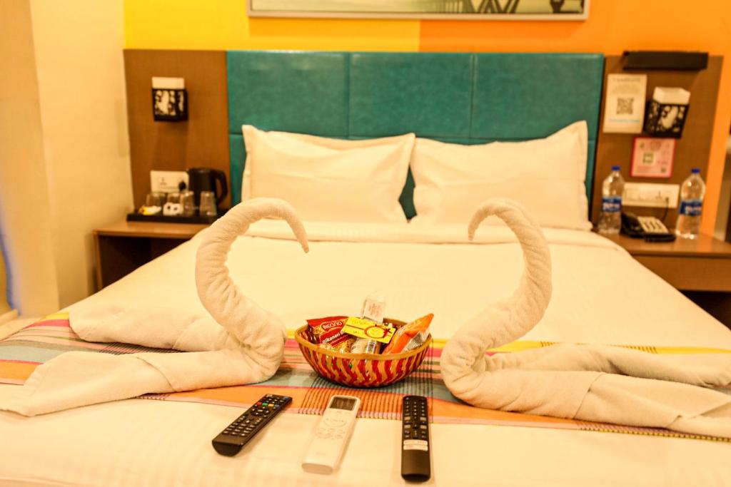 Postel nebo postele na pokoji v ubytování Hotel White Fields Hitec City, Hyderabad