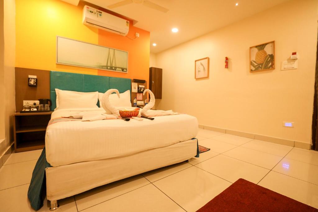 Postel nebo postele na pokoji v ubytování Hotel White Fields Hitec City, Hyderabad