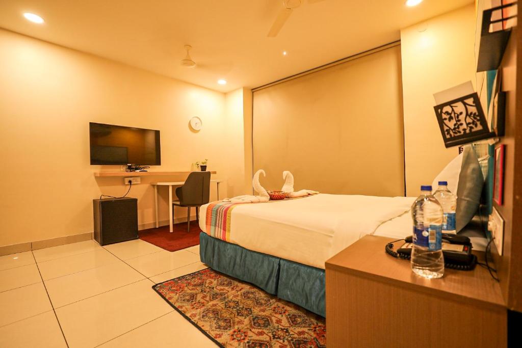 Postel nebo postele na pokoji v ubytování Hotel White Fields Hitec City, Hyderabad