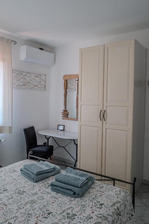 Postel nebo postele na pokoji v ubytování I Ginepri B&B