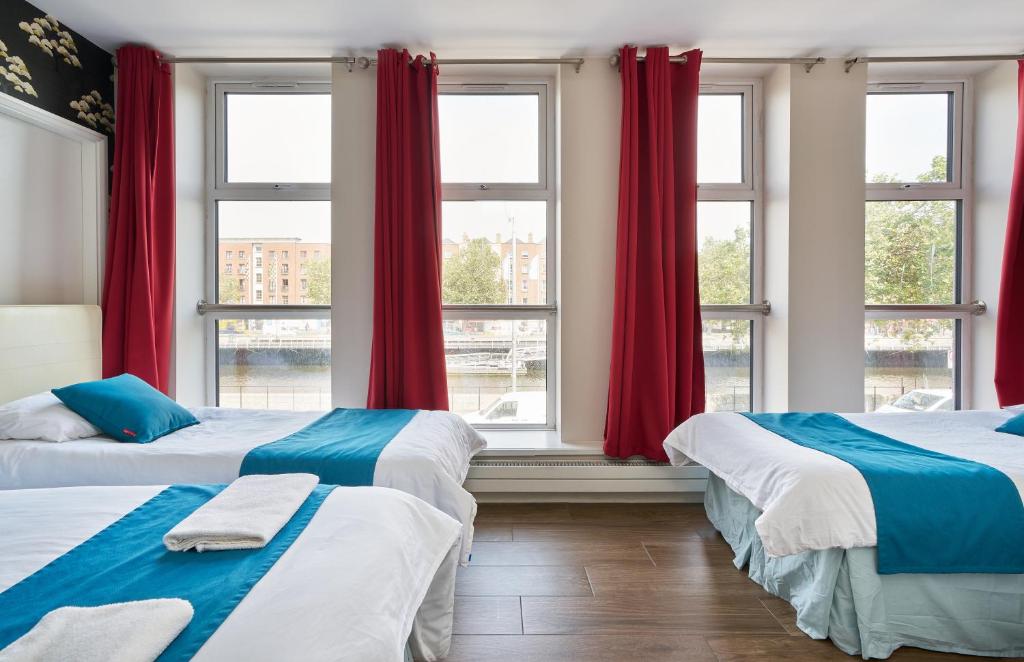 Postel nebo postele na pokoji v ubytování Abigail's Hostel