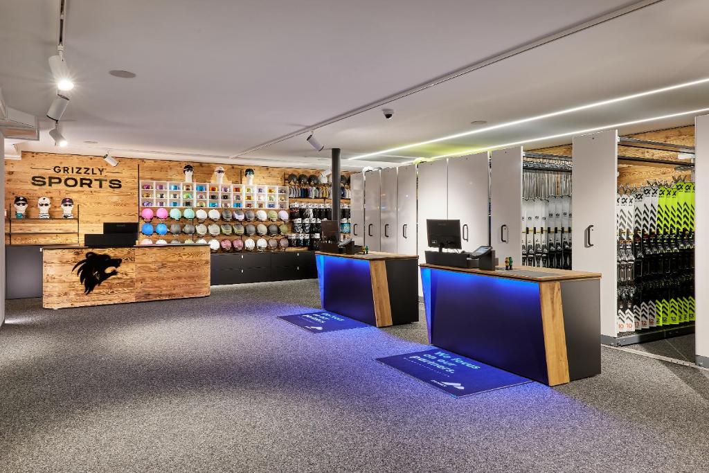 a visualization of a wine store with a display of wine bottles at Hotel Tyrolerhof in Sölden