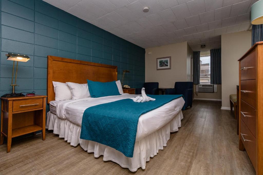 Postel nebo postele na pokoji v ubytování Charlroy Motel