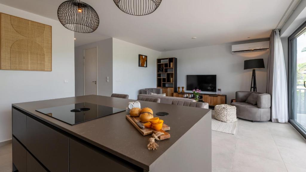 TV a/nebo společenská místnost v ubytování Luxe Breeze