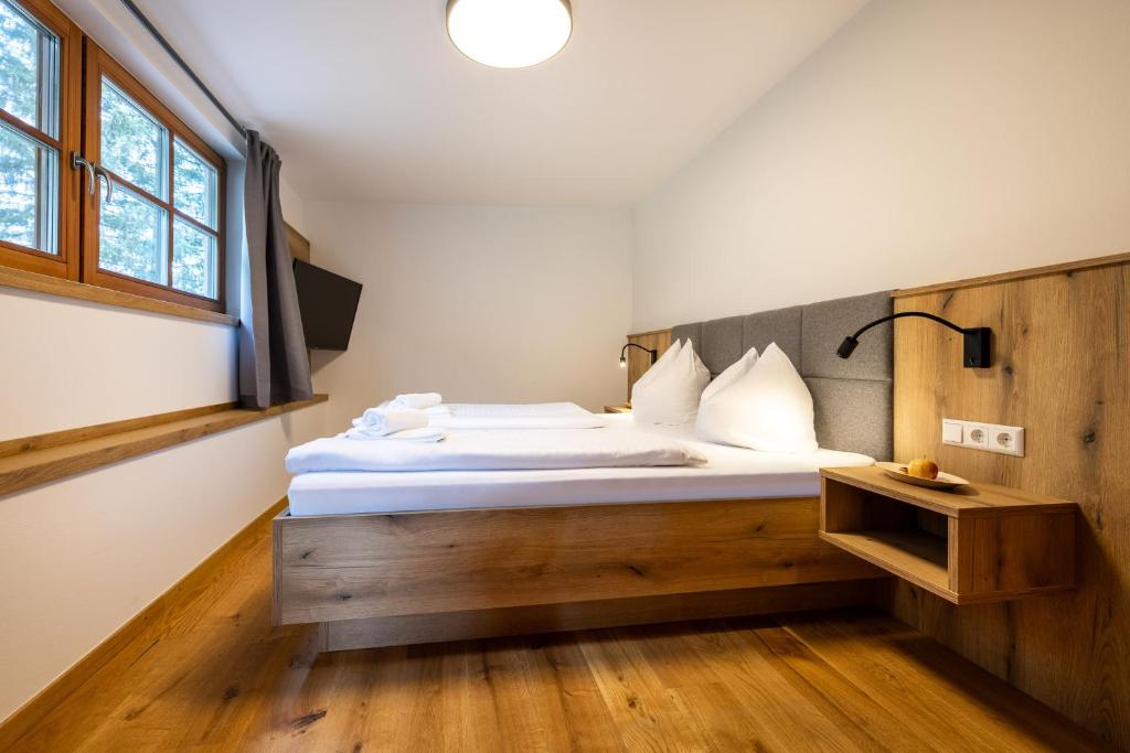 Posteľ alebo postele v izbe v ubytovaní Der Lammhof - Appartements Kaswurm