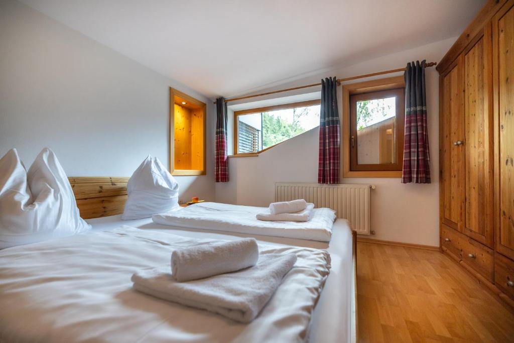 Posteľ alebo postele v izbe v ubytovaní Der Lammhof - Appartements Kaswurm