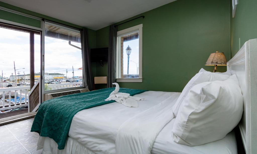 Postel nebo postele na pokoji v ubytování Charlroy Motel