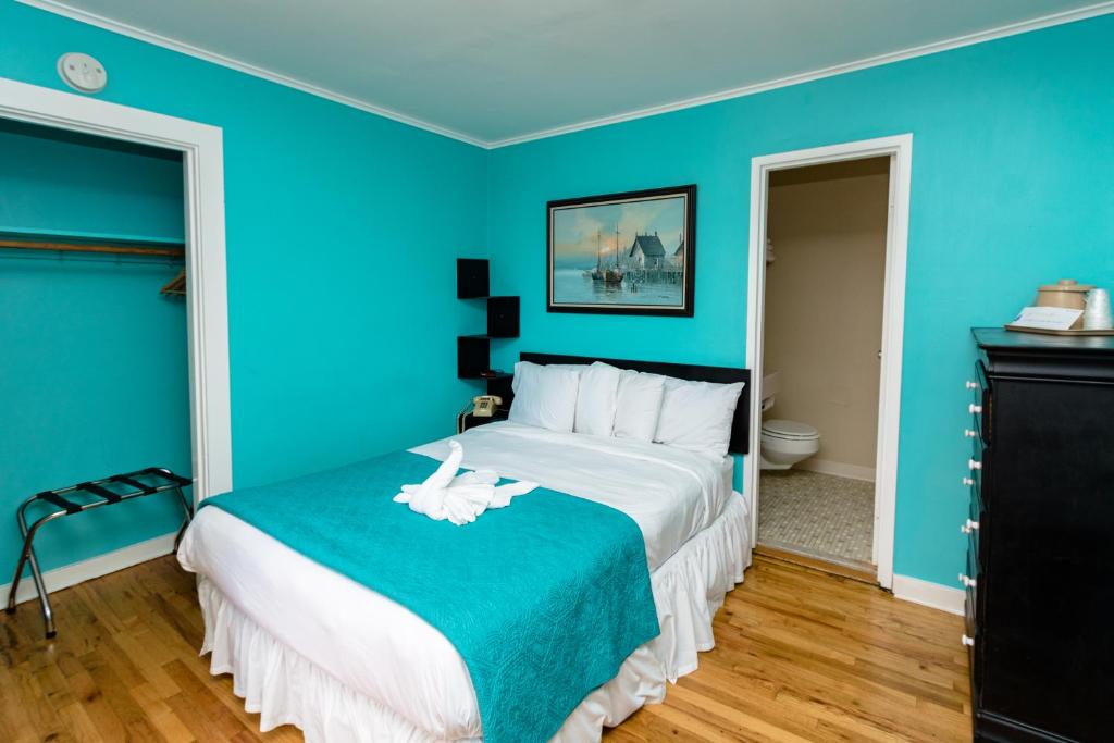 Postel nebo postele na pokoji v ubytování Charlroy Motel