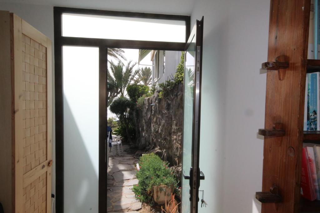 Zahrada ubytování Estupendo bungalow cerca del mar