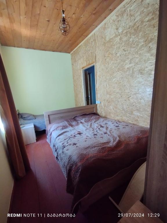 Postel nebo postele na pokoji v ubytování guest house udziro