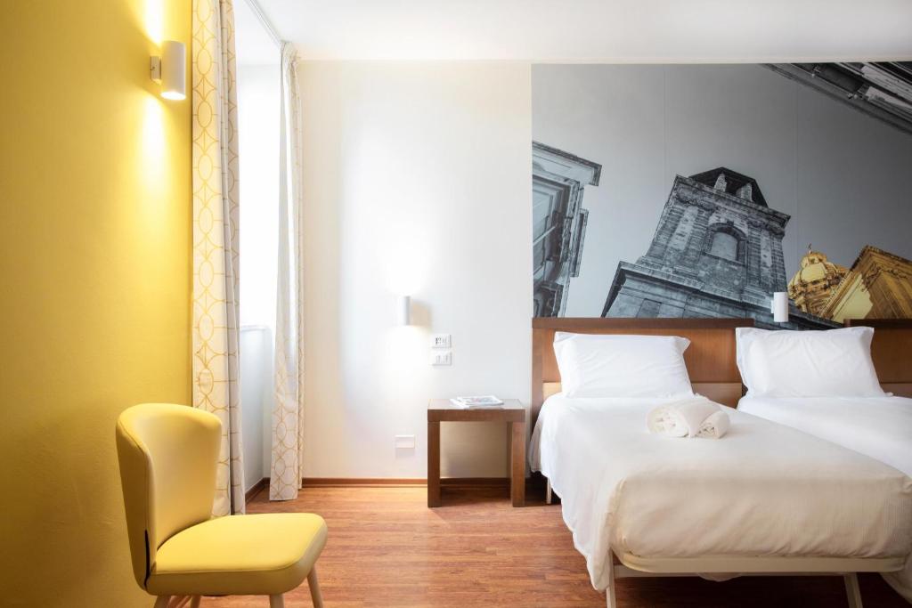 Uma cama ou camas num quarto em B&B Hotel Palermo Quattro Canti