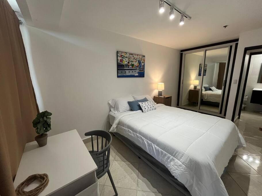 Postel nebo postele na pokoji v ubytování Apartamento frente al mar