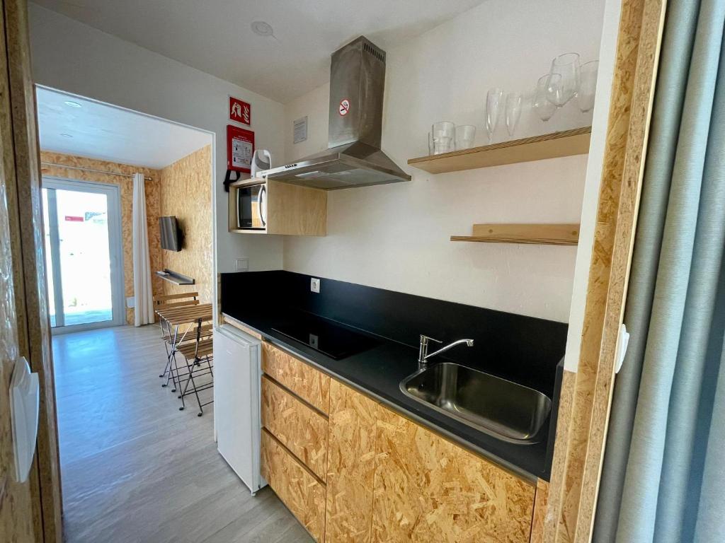 Kuchyň nebo kuchyňský kout v ubytování 818 Centro Náutico Bungalows