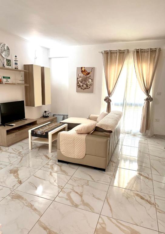 Televízia a/alebo spoločenská miestnosť v ubytovaní Diana'S Exclusive Apartment