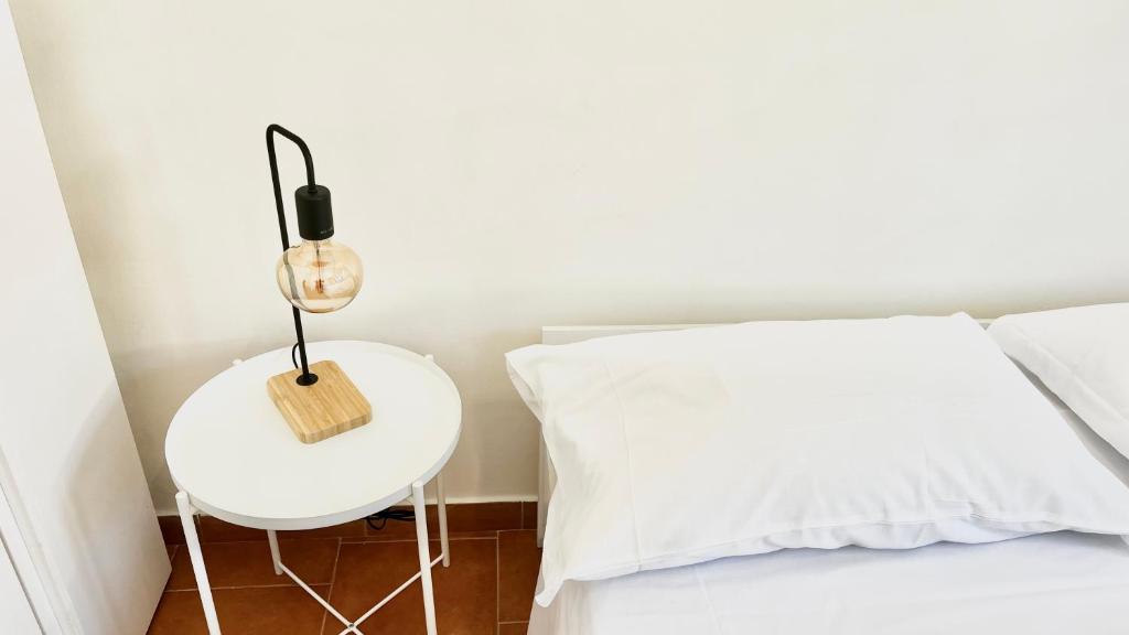 Postel nebo postele na pokoji v ubytování SambaSS Apartment