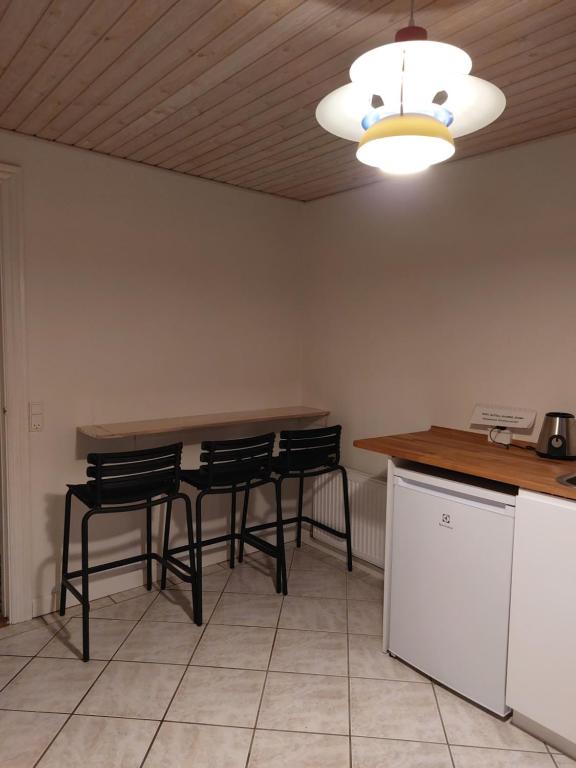 Kuchyň nebo kuchyňský kout v ubytování 55Tørring