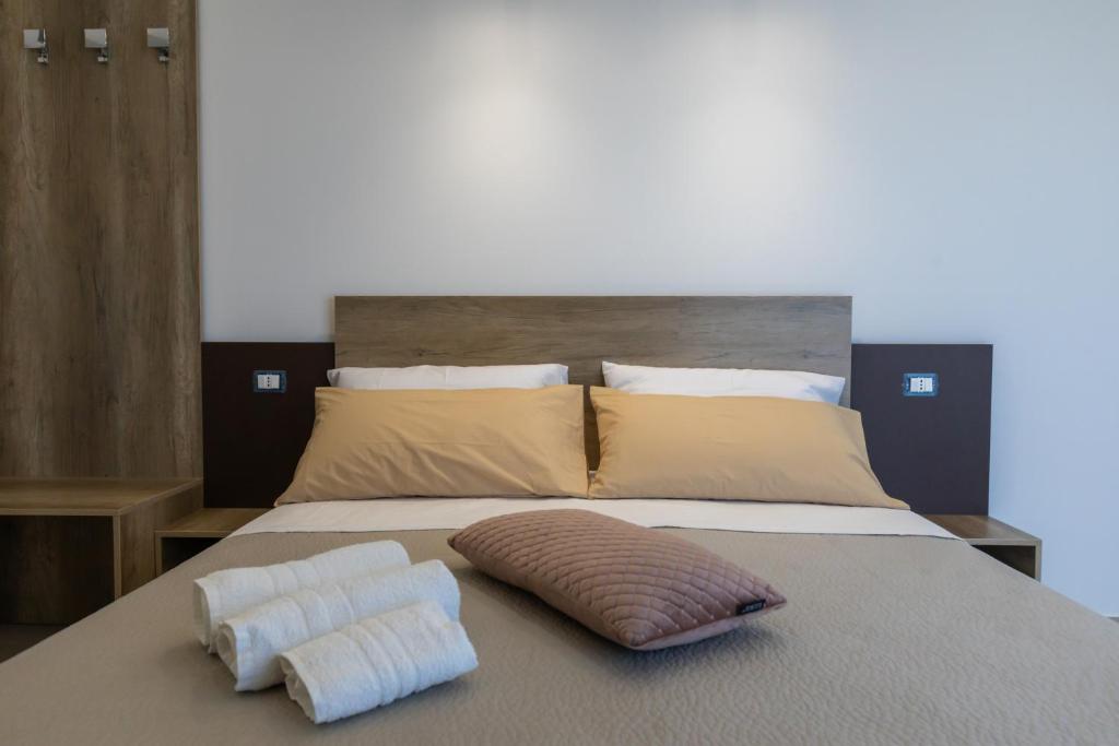 Postel nebo postele na pokoji v ubytování Altum Hotel Tropea