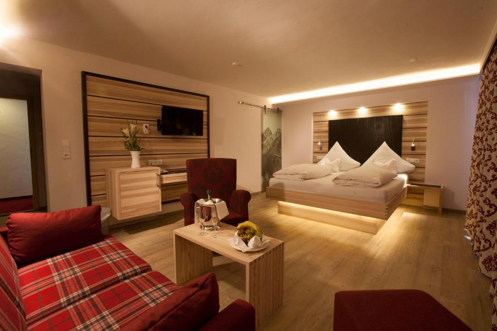 TV a/nebo společenská místnost v ubytování Hotel Filser