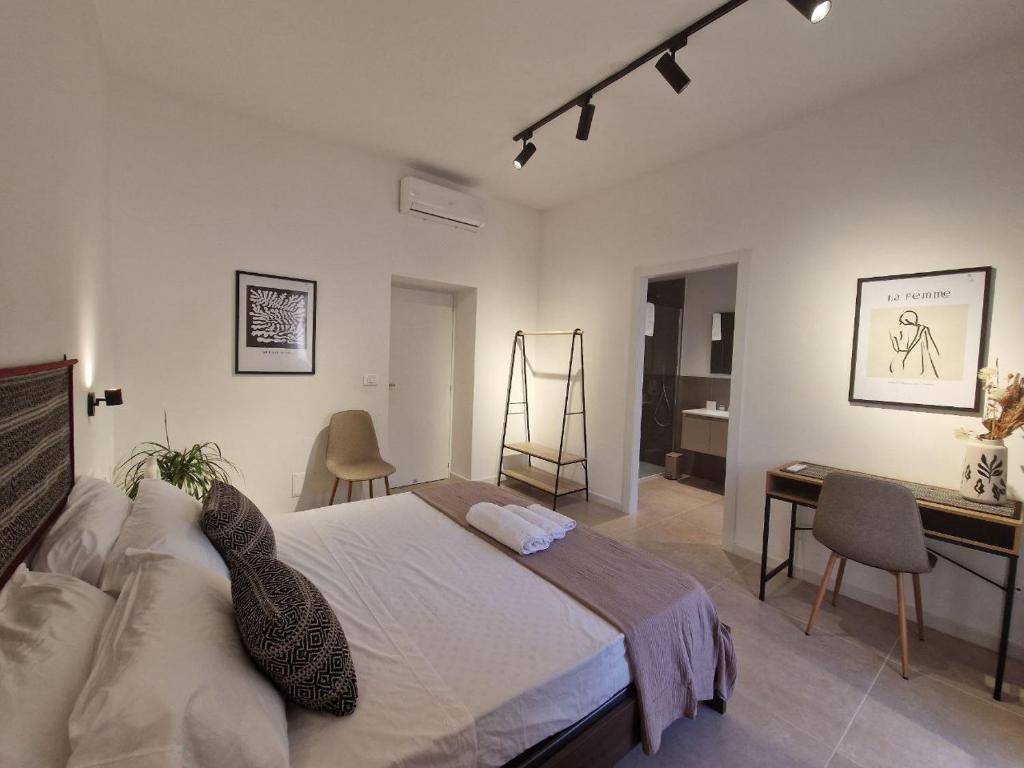 Postel nebo postele na pokoji v ubytování Via Sassari 177 Alghero